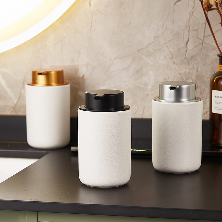 Ceramic soap dispenser with pump