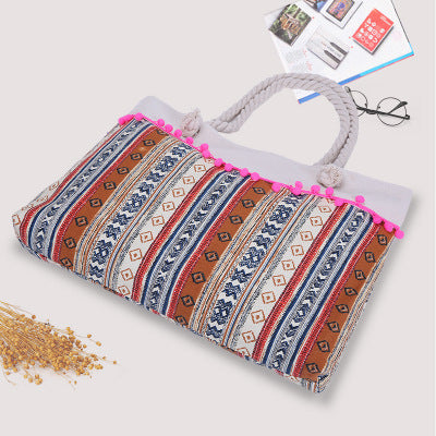 Large beach bag with crocheted embellishments Bowlift