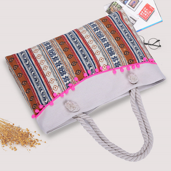 Large beach bag with crocheted embellishments Bowlift