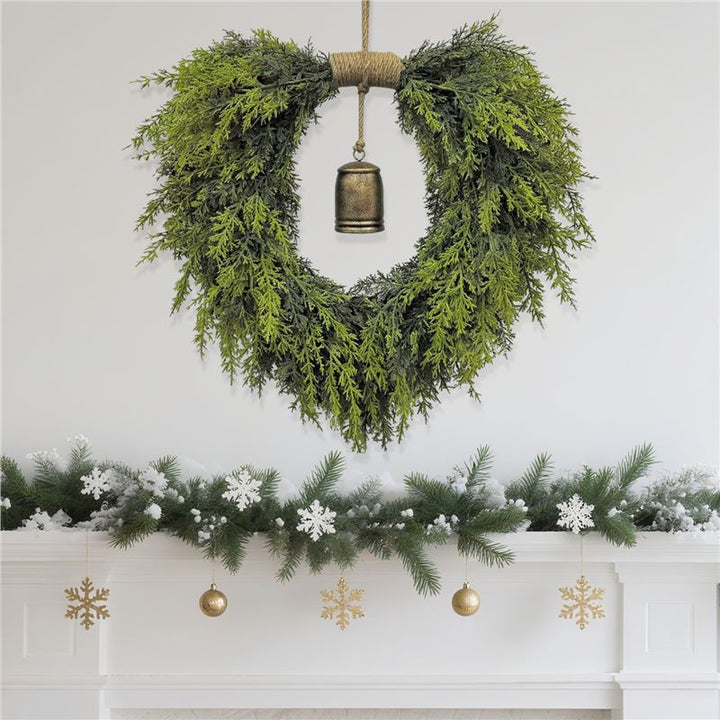 Heart-shaped Christmas wreath with bells