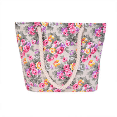 Beach bag with sturdy rope handles and floral details Bowlift