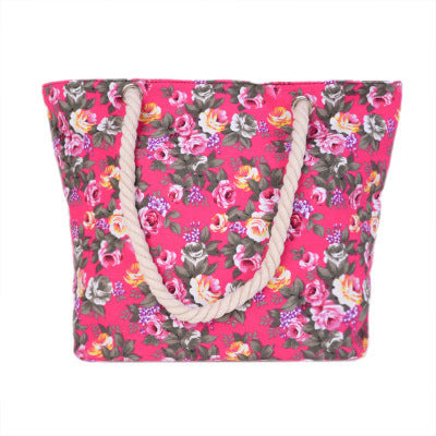 Beach bag with sturdy rope handles and floral details Bowlift