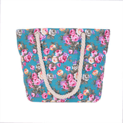 Beach bag with sturdy rope handles and floral details Bowlift