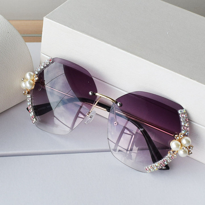 Women extravagant oversized sunglasses with pearl embellishments Bowlift