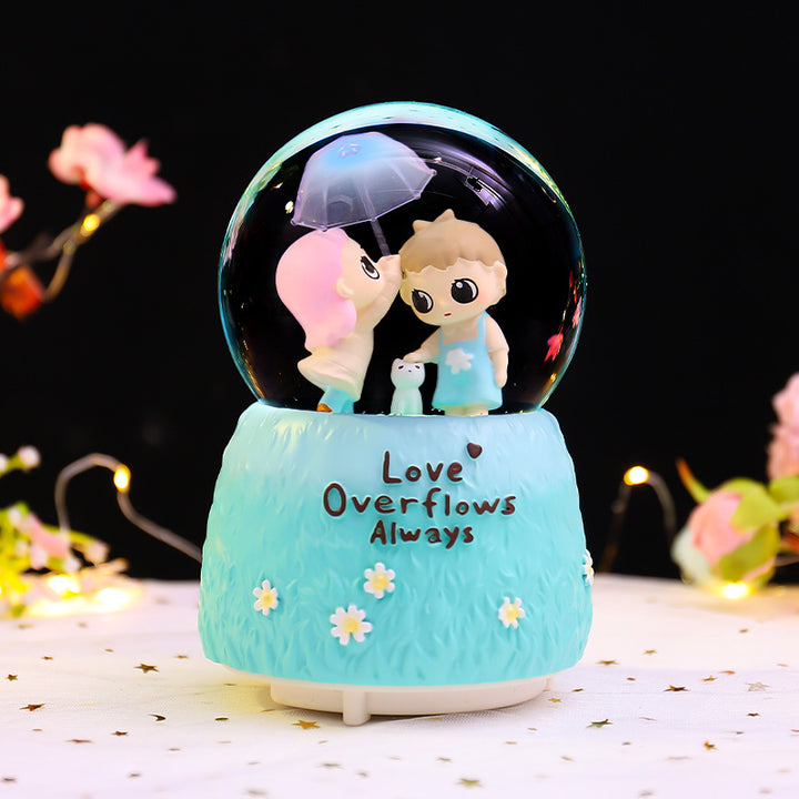 Decorative music box with carousel and snow effect