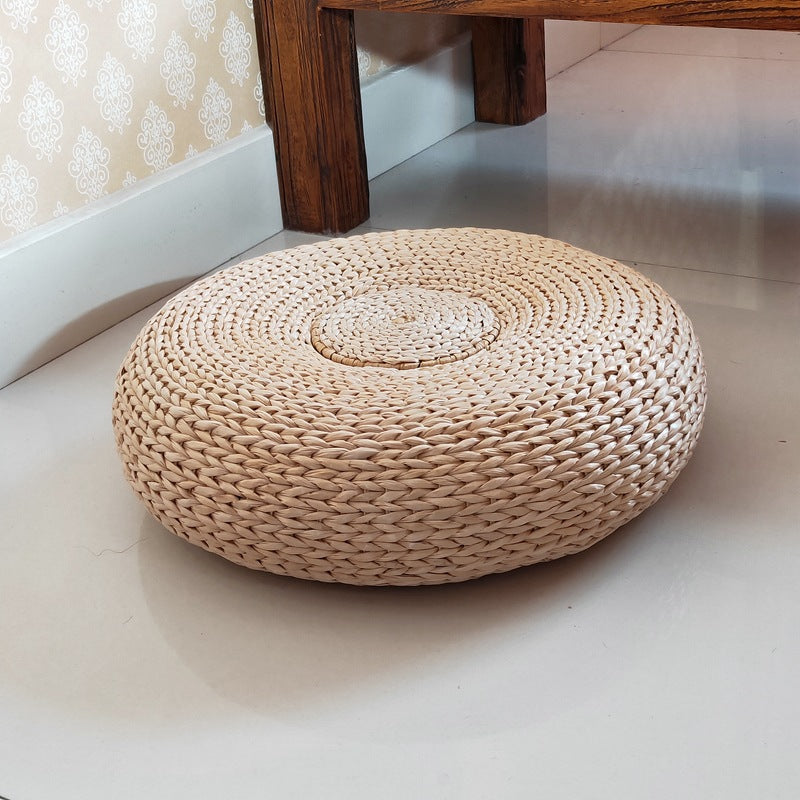 Handcrafted sitting pouf made of natural material Bowlift