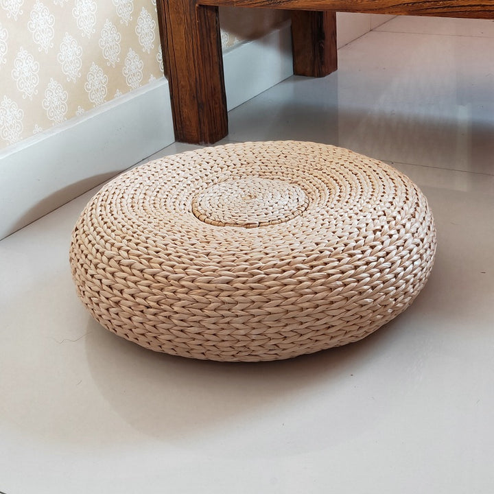 Handcrafted sitting pouf made of natural material Bowlift