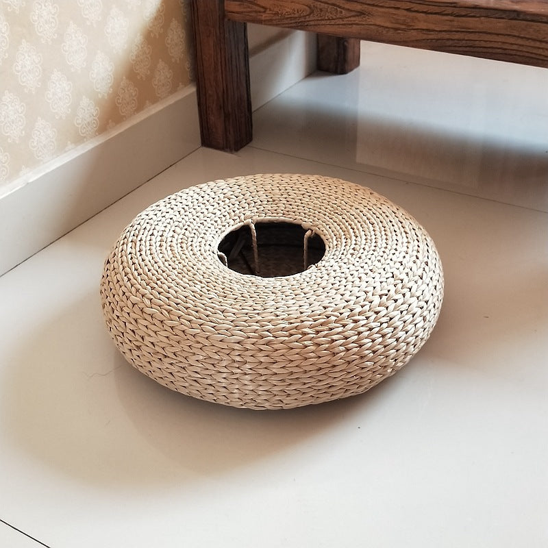 Handcrafted sitting pouf made of natural material Bowlift