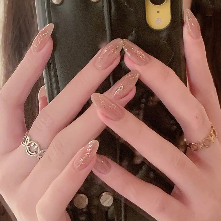 Elegant artificial nails with sparkling glitter Bowlift
