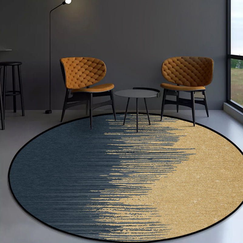 Modern living room rug in blue and yellow with abstract stripe color block print rug polyester machine washable rug for the living area | Bowlift