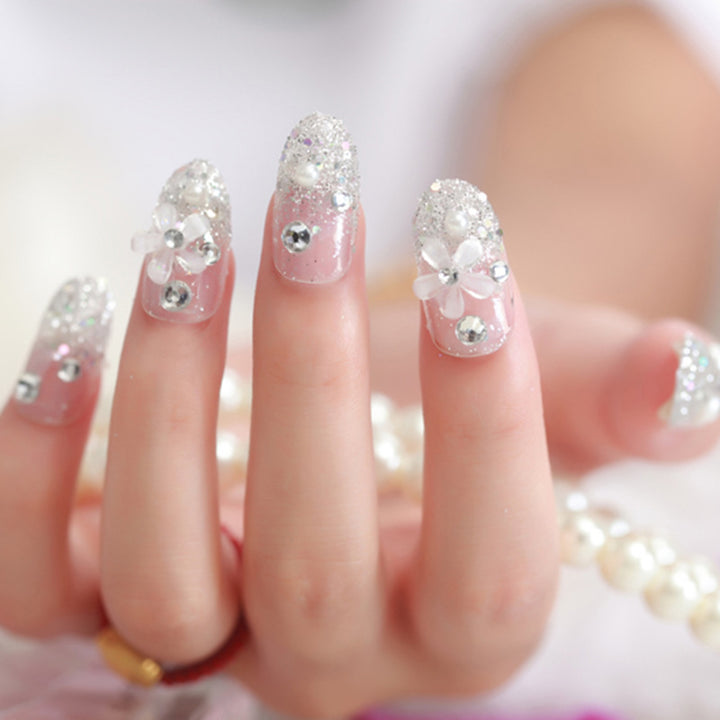 Artificial nails with delicate floral decorations Bowlift