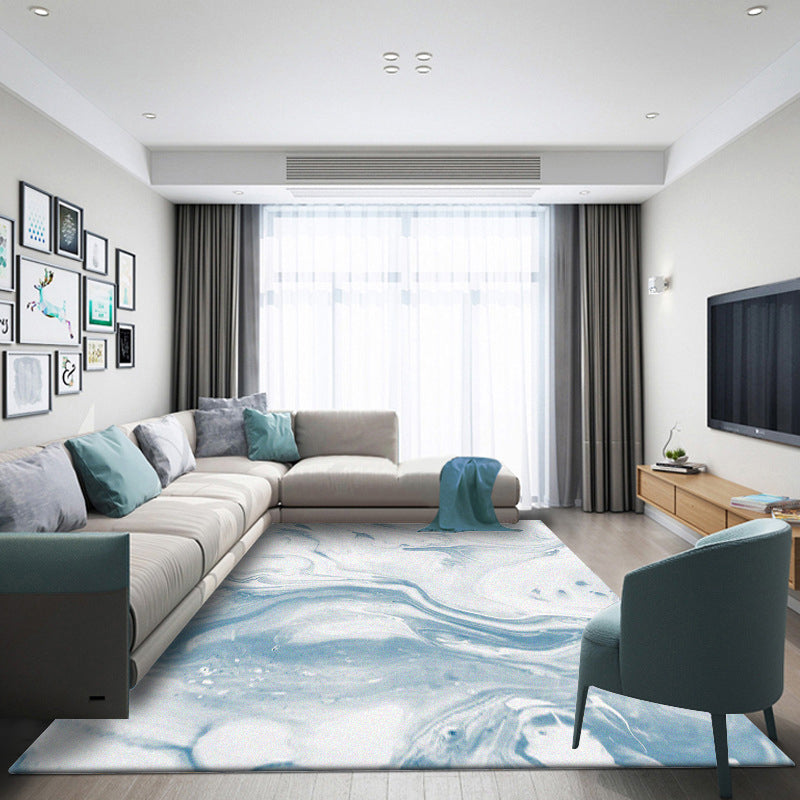 Modern living room rug in blue and white abstract ocean print rug polyester washable pet-friendly rug | Bowlift