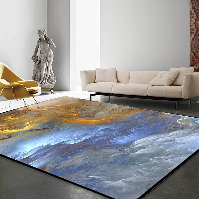 Modern living room rug in blue and yellow abstract cloud pattern rug polyester stain resistant washable area rug | Bowlift