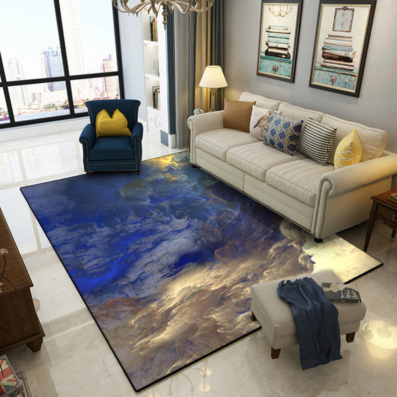 Modern living room rug in blue and yellow abstract cloud pattern rug polyester stain resistant washable area rug | Bowlift