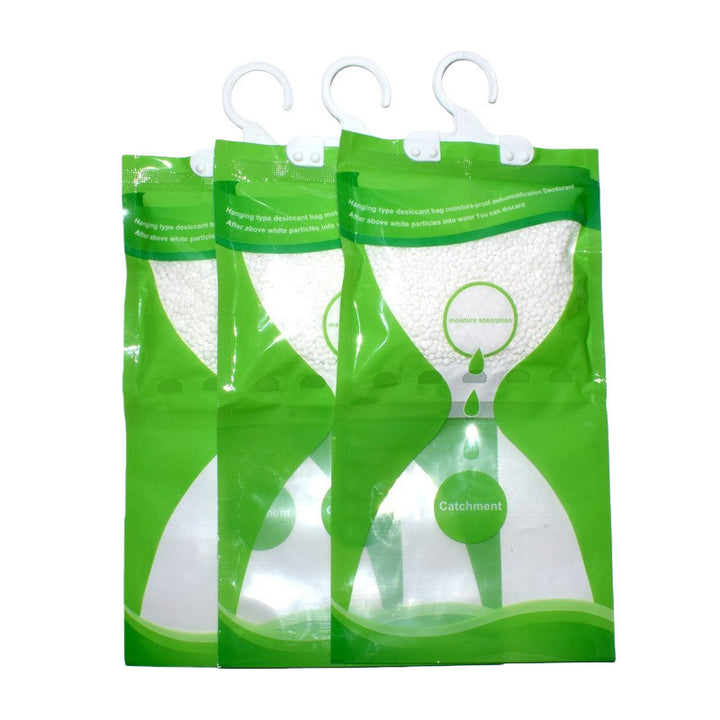 Hanging dehumidifying bag against moisture