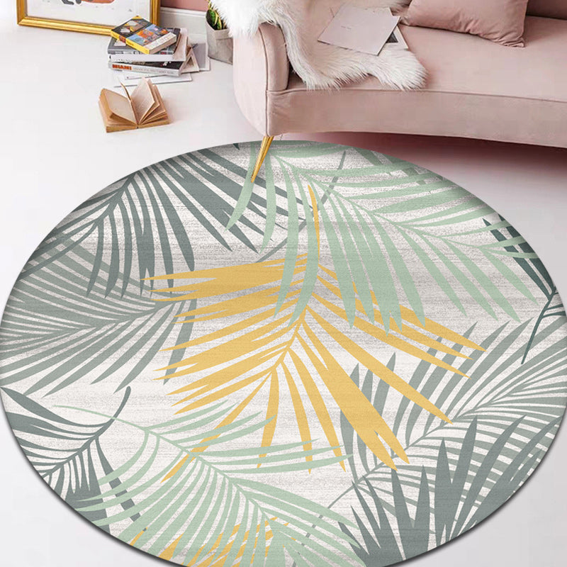 Modern botanical patterned rug with feather, multicolored polyester rug, washable, pet-friendly, non-slip rug for the living room | Bowlift