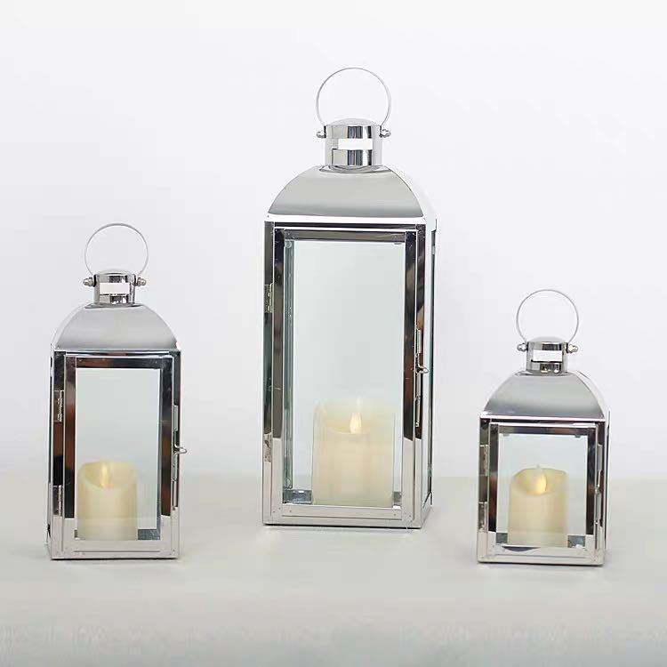 Glass-Paneled Metal Lantern Trio with Carry Rings Bowlift