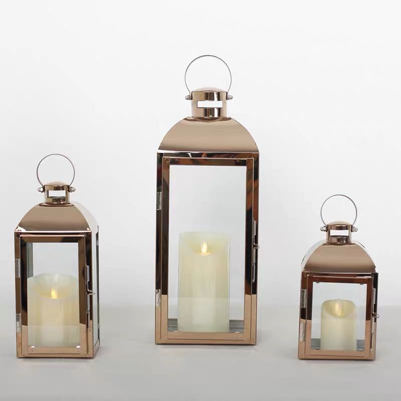 Glass-Paneled Metal Lantern Trio with Carry Rings Bowlift