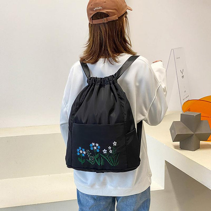 Multifunctional travel backpack with drawstring and embroidery | Bowlift