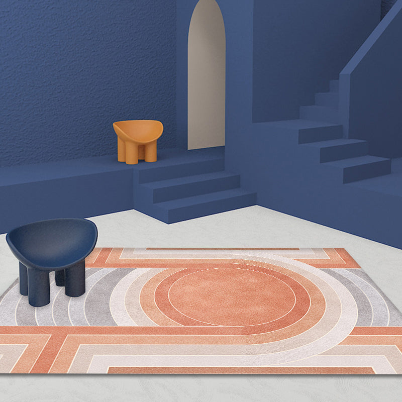 Orange modern carpet made of polypropylene, geometric and striped pattern, pet-friendly washable non-slip carpet for the living room | Bowlift