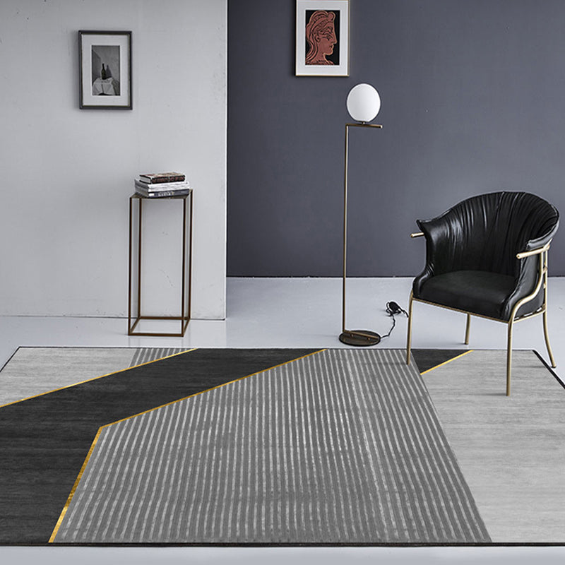 Black geometric patterned rug with stripes, modern area rug made of polyester, washable, non-slip backing rug for the study | Bowlift