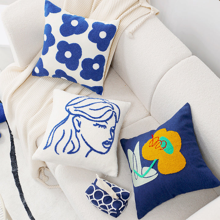 Pillowcase with embroidered daisy motif