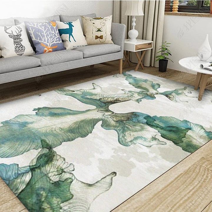 Unique botanical patterned rug with gray and blue leaves, non-slip backing, washable rug for the bedroom | Bowlift
