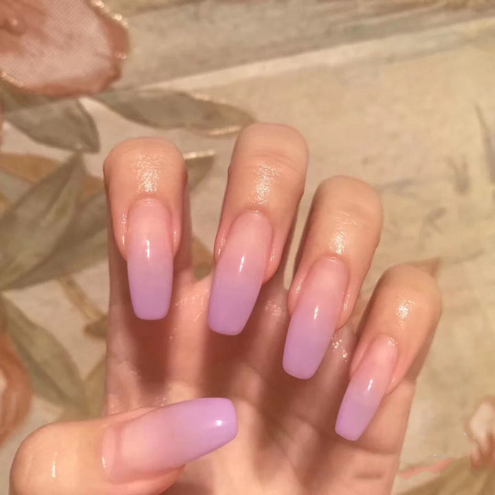 Artificial nails in modern French Tip design Bowlift