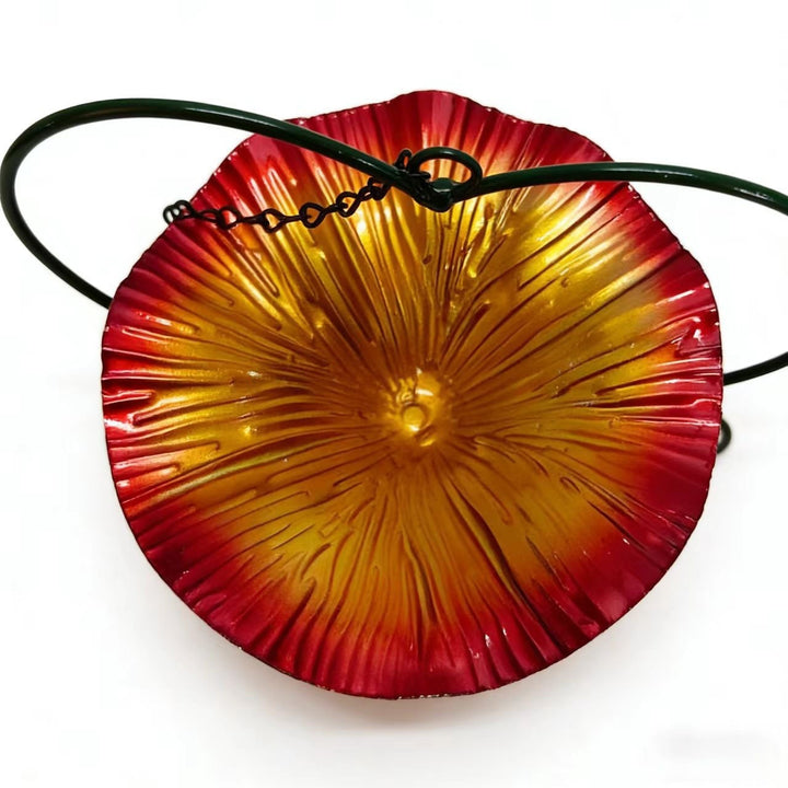 Decorative bird feeder station made of iron in flower shape