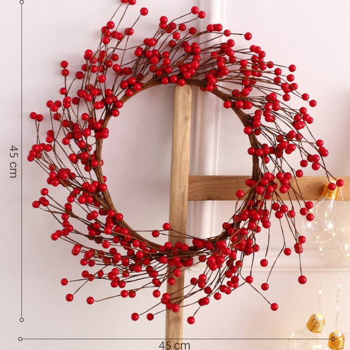 Christmas wreath with berries and fruits