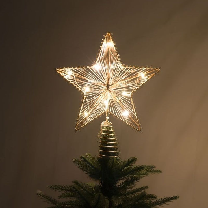 Illuminated Christmas tree topper star made of iron