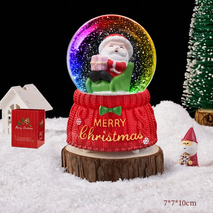 Christmas snow globe with music box and carriage design