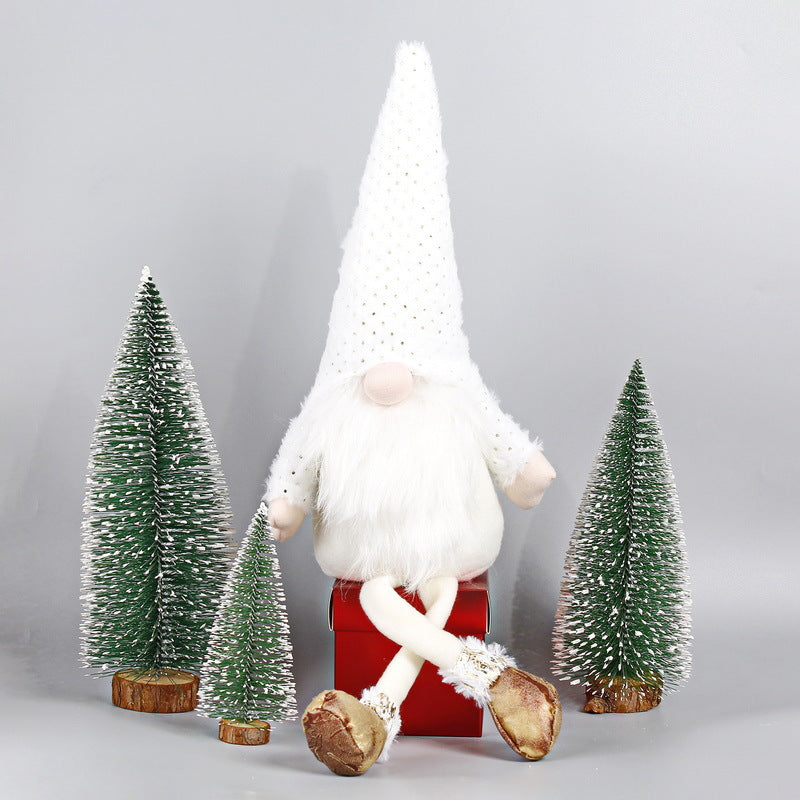Christmas elf figure with long legs, sitting