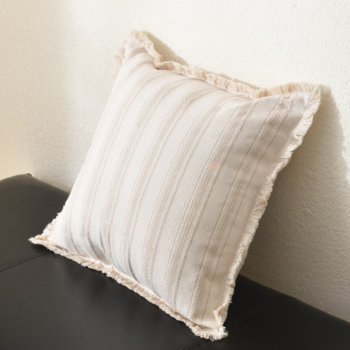 Square decorative pillow with stripe pattern