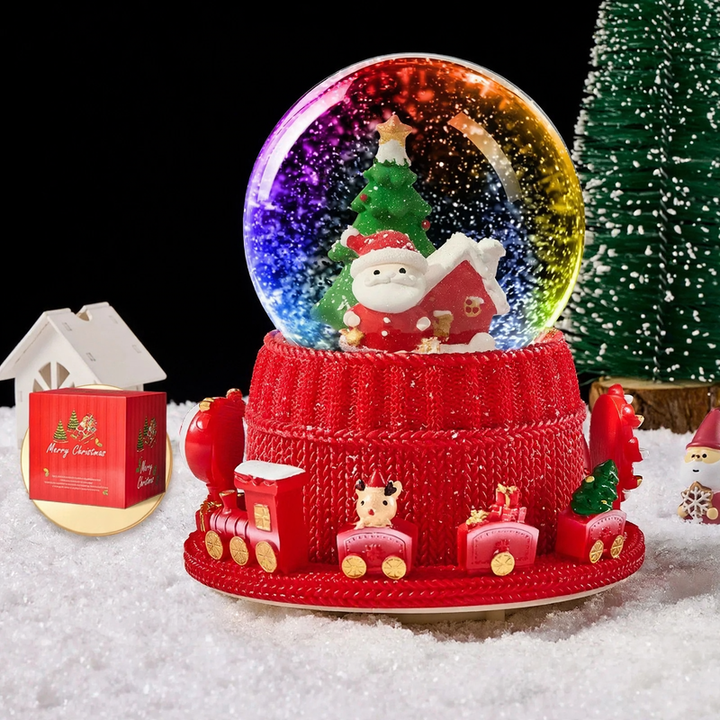 Christmas snow globe with music box and carriage design