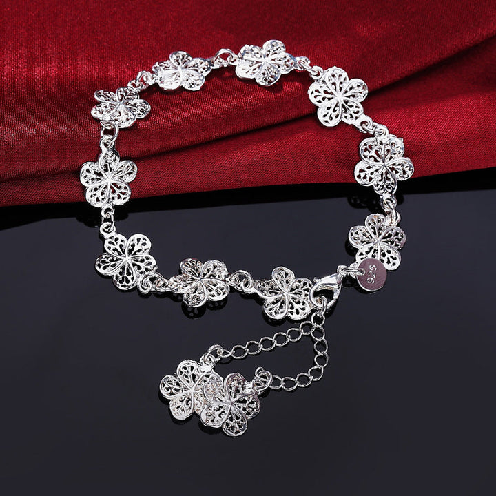Elegant Silver Filigree Bracelet with Unique Links Bowlift