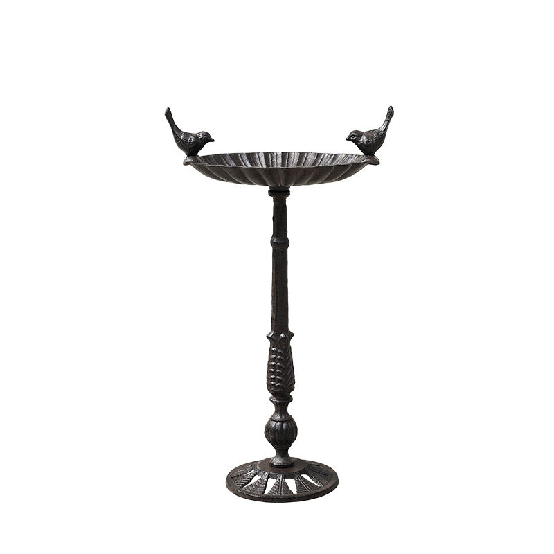 Antique cast iron birdbath on stand