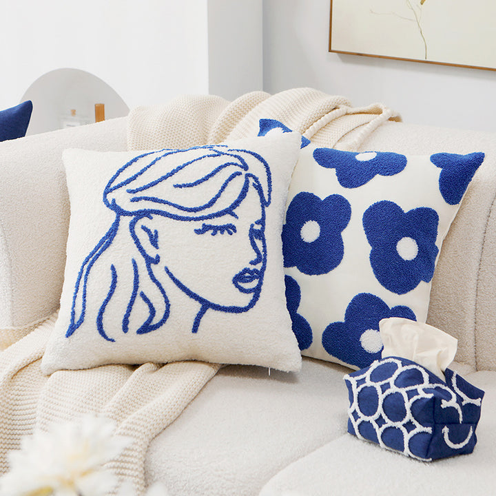 Pillowcase with embroidered daisy motif