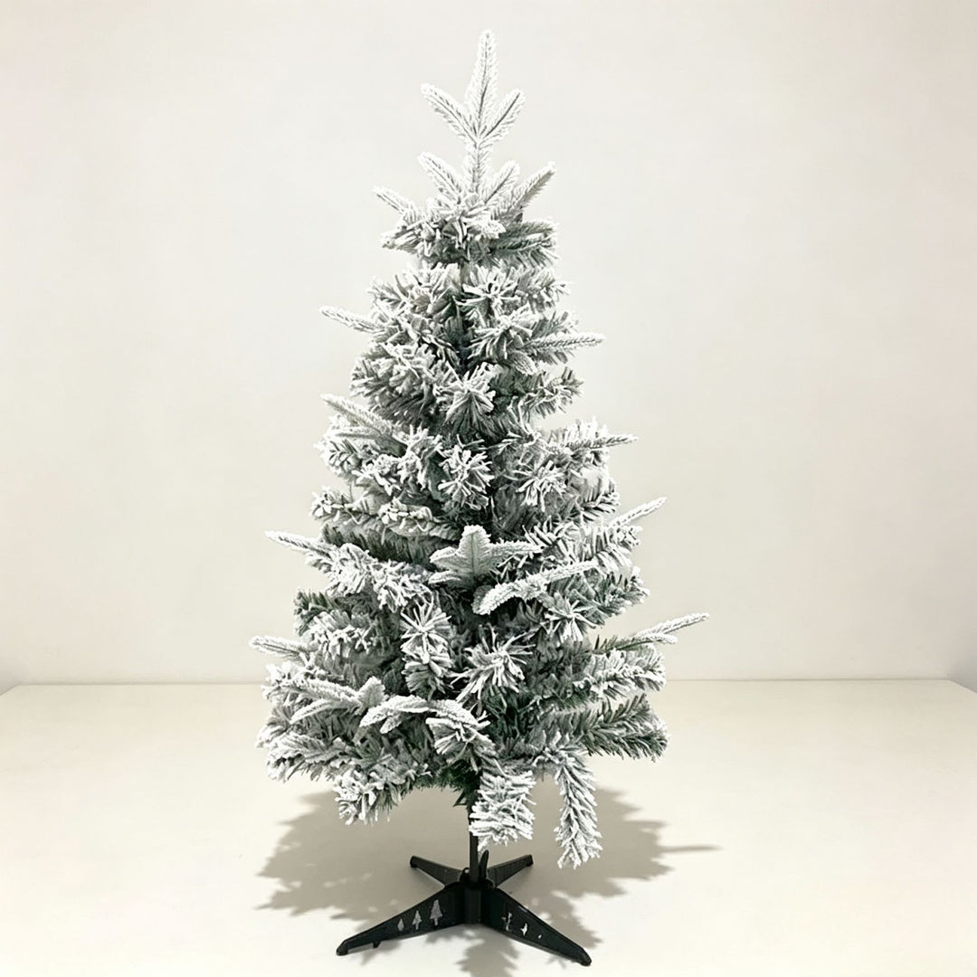 Mini Christmas tree for the table, snow-covered, with lighting