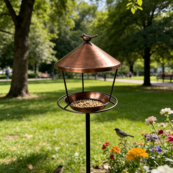 Bird feeding station with ground spike made of iron