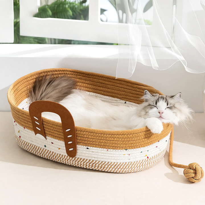 Braided cat bed in loaf shape made of felt