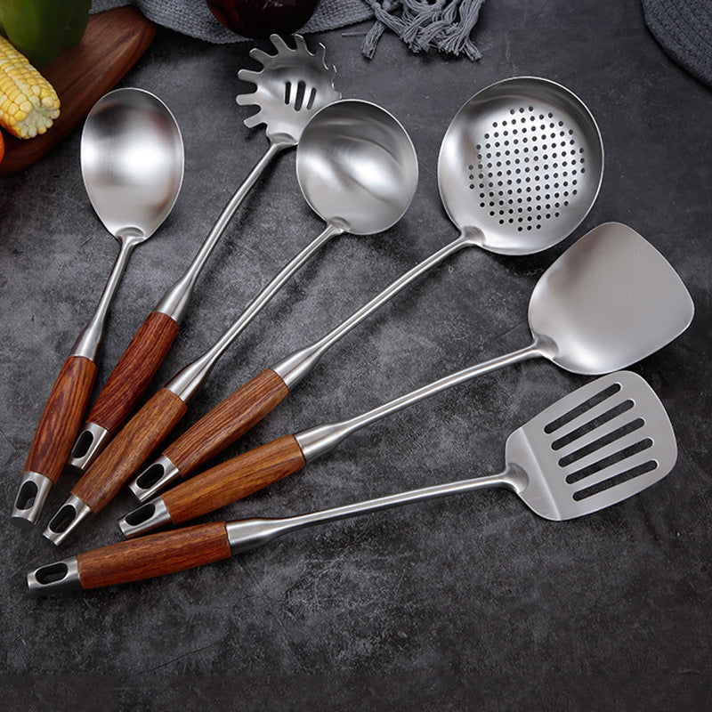 Stainless steel kitchen utensil set with wooden handles