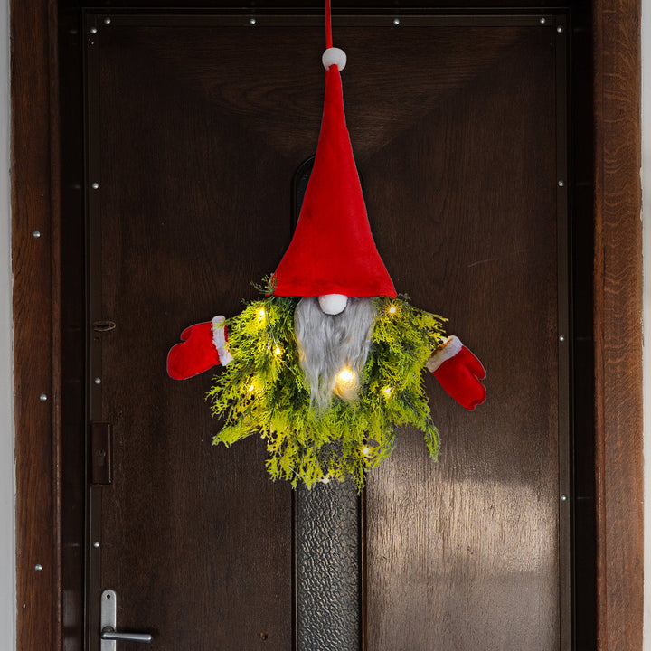 Creative Christmas wreath with gnome motif and lighting