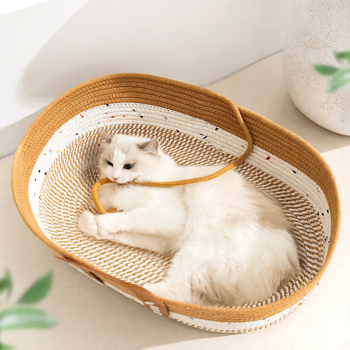 Braided cat bed in loaf shape made of felt