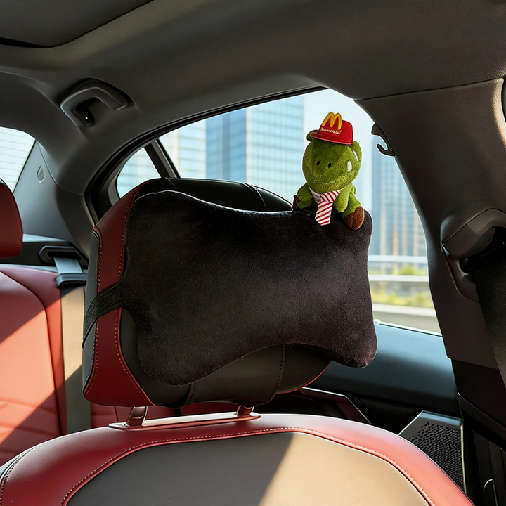 Car headrest with dinosaur design