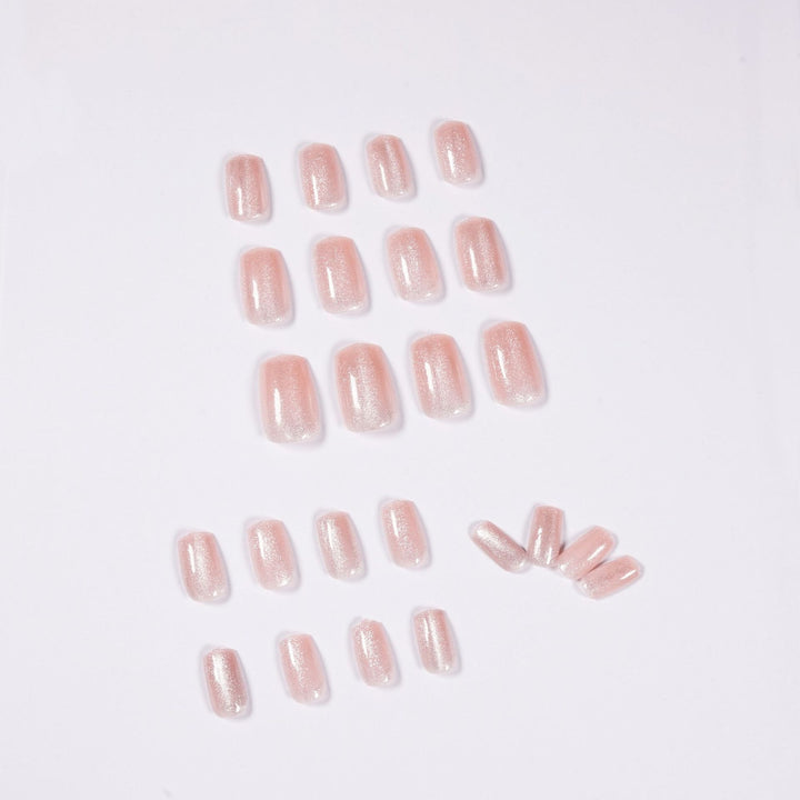 Artful nail art with a gentle glitter effect and elegant finish Bowlift