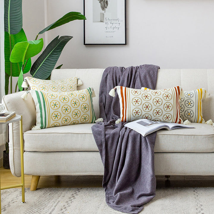 Decorative cushion cover with woven medallion pattern and tassels Bowlift