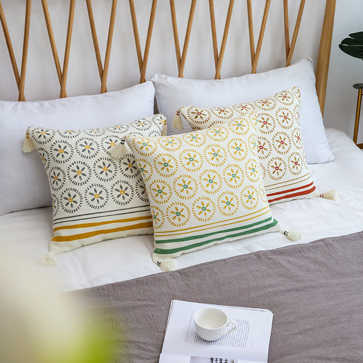 Decorative cushion cover with woven medallion pattern and tassels Bowlift
