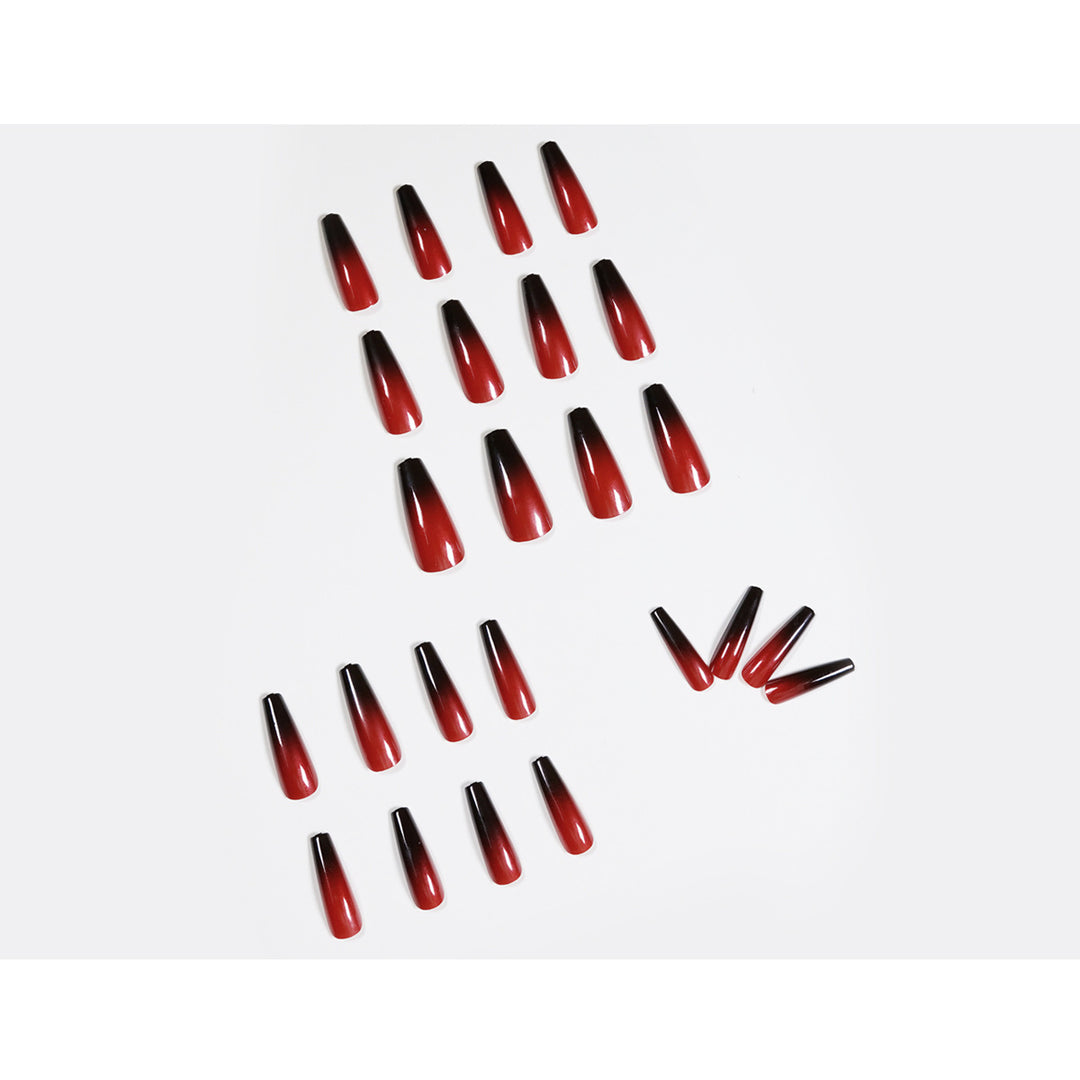 Artificial nail art in elegant stiletto design with glossy gradient colors Bowlift