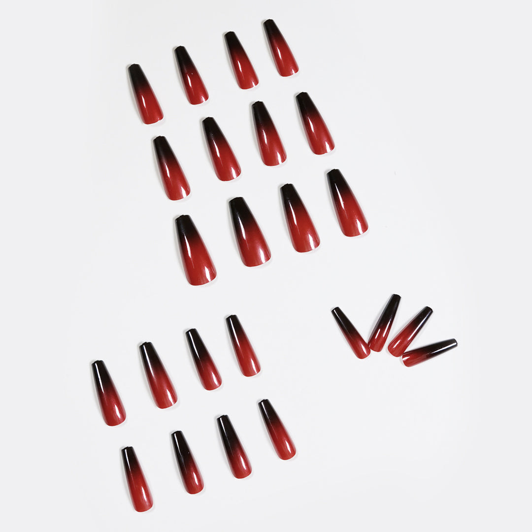 Artificial nail art in elegant stiletto design with glossy gradient colors Bowlift